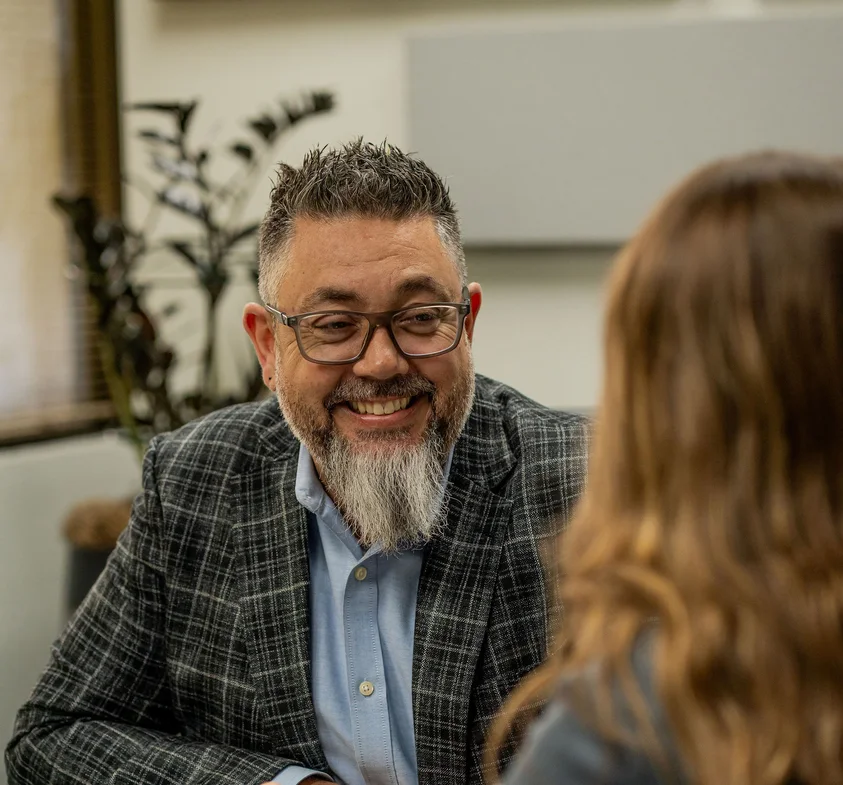 Attorney David Ranz discussing a personal injury claim with a client at Ranz Injury Law in Federal Way